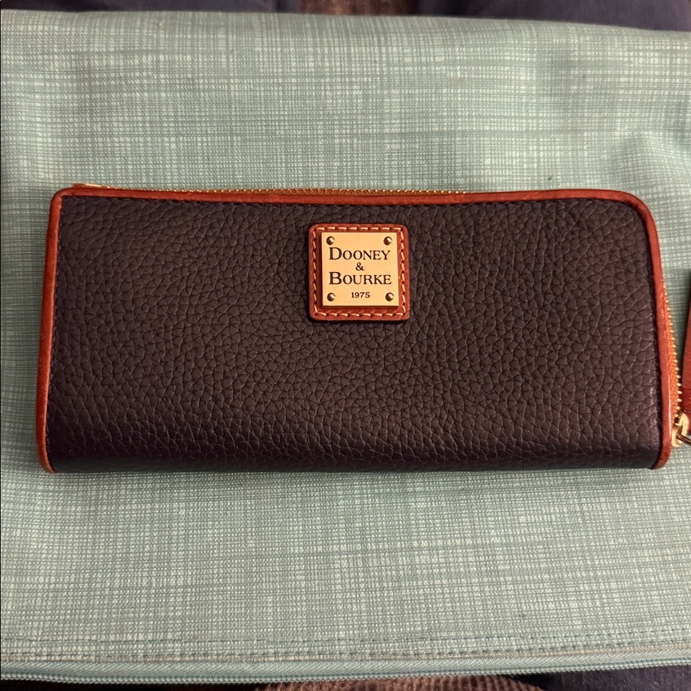 Dooney & Bourke Navy Blue Leather Zip Around Wallet with Gold Accents.  NEW!